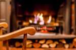 home-comfort-rocking-chair-near-fireplace-photo-interior-room-rocking-chair-living-room-with-decorated-modern-fireplace